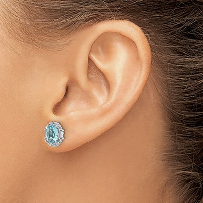 Sterling Silver Light Blue Oval-Cut CZ Solitaire w/White CZ Stones Halo Post Earrings